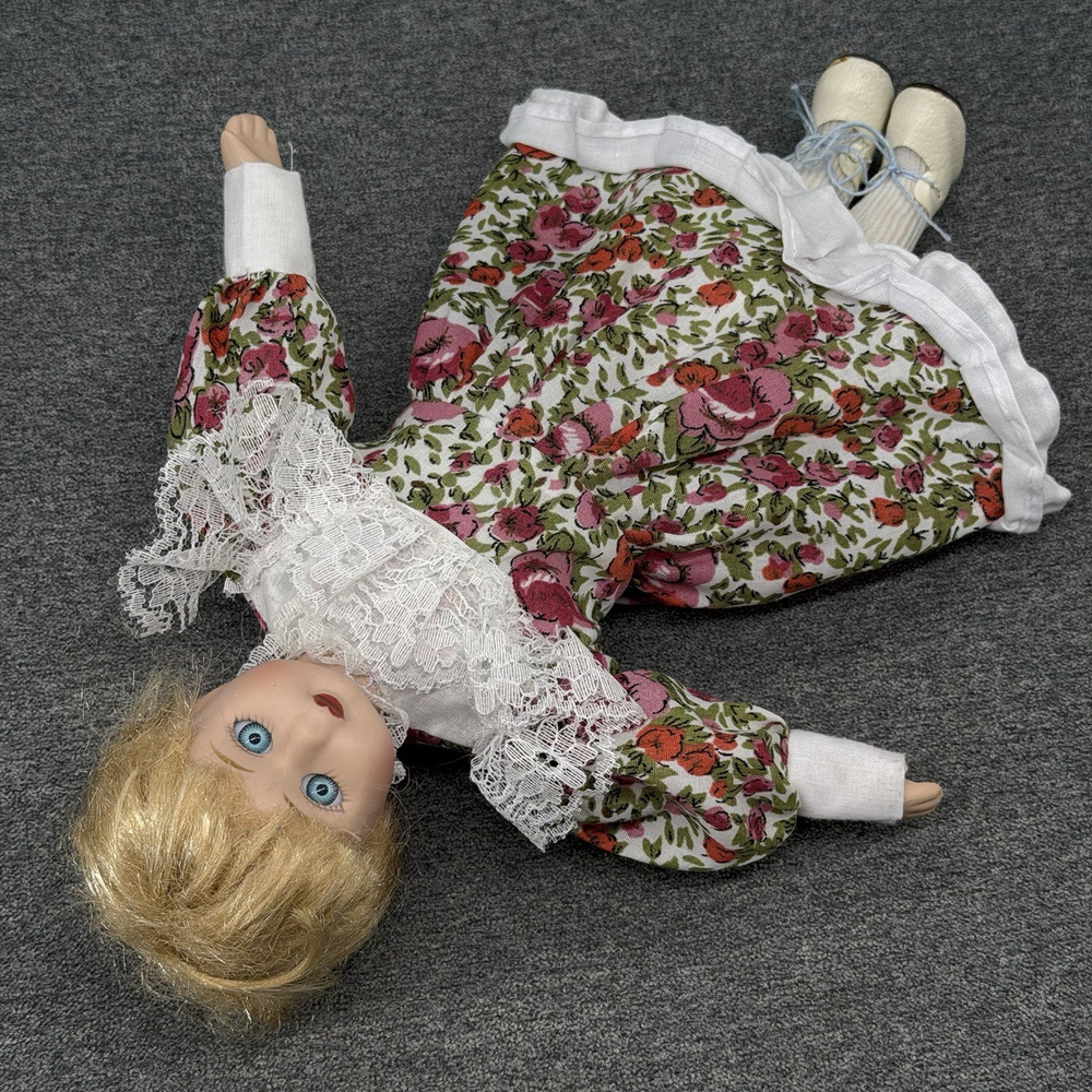 Vintage Porcelain Doll Icy Blue Eyes Flat Nose Floral Dress Cute Creepy Oddity